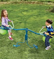 Spinning Seesaw And Hop Ball In One Spiro Hop Outdoor Toy Would Be A Good Combo Birthday Gift Backyard Toys Outdoor Toys For Kids Outdoor Kids