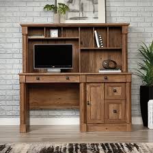 The sauder edge water computer desk comes in estate black and has storage for your tower, as well as two lower drawers for files, including provisions for hanging folders. Sauder Vine Crest Computer Desk W Hutch 421972 The Furniture Co