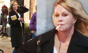 Melanie Griffith pairs a cigarette and pink flip-flops for a Los Angeles  walk