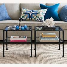 It's equipped with an open shelf and a roomy drawer, giving you plenty of space for both display and storage. Pottery Barn Tanner Square Bunching Coffee Table Aptdeco