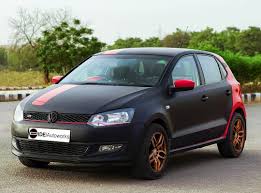 Fantastic Volkswagen Polo Wrapped In Matte Black And Gloss Hot Rod Red Brilliant Work By Ideautoworks Gurgaon India Polo Car Vinyl Wrap Car Volkswagen Polo