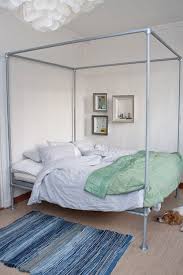 A bed can look elegant and romantic with a canopy featuring rich fabrics. 47 Diy Bed Frame Ideas Built With Pipe Simplified Building