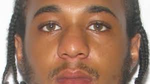 Man accused of killing 3 in Granby Street shooting arraigned