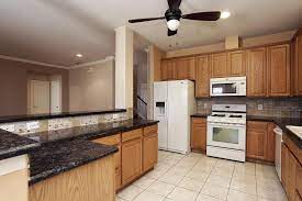 In this kitchen layout, there are several layers of cabinets which hold the accessories, giving the kitchen space an organized look. Galley Kitchen Small Kitchen Design Layout 10x10 Novocom Top