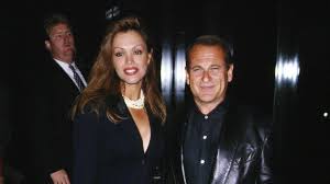 In the mid-1990s, Joe Pesci and Claudia Haro appeared together at public  events with an ease that felt natural and genuine. The photograph from a  golf tournament in 1995 captures them smiling,