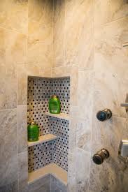 The smaller mosaic tiles in the niche echo the larger rectangles outside, while intersecting with the vertical accents. Shower Niche Ideas Transitional Bathroom Denver By Jan Neiges Cmkbd With Nkba Houzz