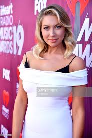 Stassi schroeder of vanderpump rules shares that she got a chin implant when she was 18 in her new book, next level basic, and is still happy with the but in her new book, next level basic: Stassi Schroeder From Vanderpump Rules At Iheart Radio Awards In Hidde Hidden Crown Hair Extensions