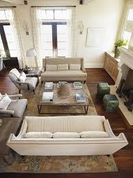 Why You Should Arrange Two Identical Sofas Opposite Of Each Other Designed Living Room Furniture Arrangement Living Room Arrangements Livingroom Layout