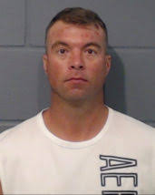 Found fugitive confined in Geary County, booked