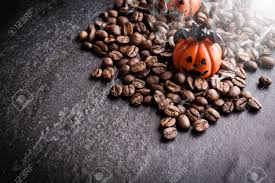 We did not find results for: Halloween Pumpkin Decoration With Coffee Beans On Dark Background Stock Photo Picture And Royalty Free Image Image 65002744
