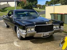 Image result for Black 1969 Cadillac