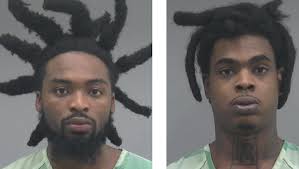 Pair arrested after guns and marijuana allegedly found in car