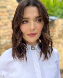 The unbelievably beautiful Rachel Weisz all ready for todays breezy, sunny  Wimbledon Men's Final 🎾 We chose a Luxuriously Lucent Lip in the shade  Painterly 🎨 Gorgeous hair by @georgenorthwood Photo by @