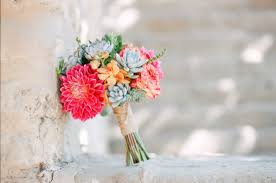 This bouquet of flowers will fit perfectly into your decoration and requires no special care. Dahlia Orchid And Succulent Wedding Bouquet