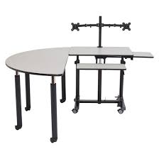 Setup a collaborative table set for kids to interact by using round activity tables. Nps Sstdt Sc Gy Sit Stand Teacher S Desk Kit W Semi Circle Table Stagedrop