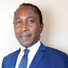 Professor Leslie Thomas KC