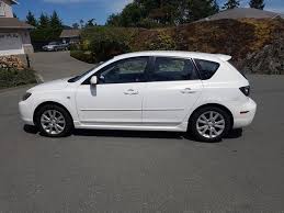 Edmunds says, the mazda 3 tends to drive like a much more expensive sport sedan j.d. 2008 5 Mazda 3 Gs Sport Hatchback Pearl White West Shore Langford Colwood Metchosin Highlands Victoria Mobile