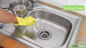 This is particularly important when unclogging a double kitchen sink drain with standing water. 3 Ways To Unclog A Kitchen Sink Wikihow