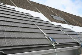 I expected to see them install a series of 1x4's over the old shingles first, & then lay the metal i can't figure out how a metal roof could leak because of warped shingles underneath? Can I Install A Metal Roof Over Shingles Rare Manufacturing