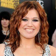 Mike moore/getty images for celebrity fight night she attended a phoenix event with dark smoky shadow and shimmery. Kelly Clarkson S Changing Looks Instyle
