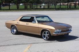Image result for Sierra Tan 1965 Corvair