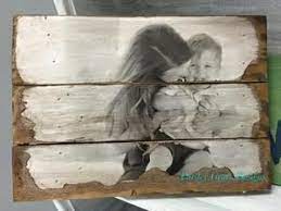Wood pallets are the new craze that are inexpensive and create beautiful designs for your home and yard. Wood Photo Pallet Your Image Transferred And Antiqued On Wood Creati Photo On Wood Picture On Wood Wood Pallet Art