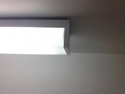 There should be three little finger nuts to loosen. Hard Time To Remove Cover From Fluorescent Light Doityourself Com Community Forums