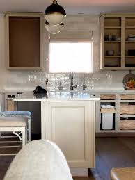 The kitchen, photographed for residence magazine, manages to straddle modern and traditional looks, with help from the neutral cabinet color. Kitchen Cabinet Paint Color Reveal Before After House Full Of Summer Coastal Home Lifestyle