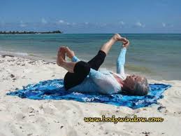 A Modification Of The Happy Baby Pose Known As Stirrup Pose In Yin Yoga Extend Your Left Leg While Hanging Onto Your Happy Baby Pose Yin Yoga Yin Yoga Poses