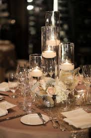 Beautiful Centerpieces Created With Candles Floating Candles Wedding Wedding Reception Candles Candle Wedding Centerpieces