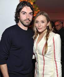 Elizabeth olsen and robbie arnett seen out and about during. Elizabeth Olsen Engaged To Robbie Arnett Of Milo Greene