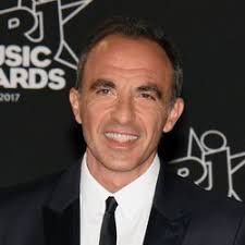 His greek parents are andreas and harula aliagas. Nikos Aliagas Paris Match