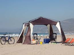 Sea, sand, sun, brilliant sunsets and dark skies. 18 Beach Tents With Extra Shade And Easy Setup Uv Protected