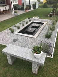 Two Spring Stone Slabs In Long Form Pools With Stainless Steel Edging Zwei Quellsteinplatten Water Garden Better Homes And Gardens Modern Outdoor Furniture
