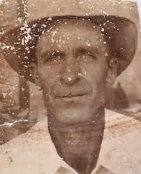 This is a picture of my grandmother Lorene Hall and kids standing at my  grandfather Clyde Hall Sr's grave in the church cemetery at the corner of  Macland Rd and Powder Springs