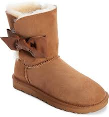 A Dainty Side Bow Caps Off This Classic Short Boot With Fresh Flirty Style The Lining Is Made From A Blend Of Genuine Shear Womens Boots Nordstrom Boots Uggs