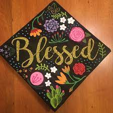 For many graduates, the traditional cap and gown is just an eccentric outfit that you wear on graduation day, but the tradition has a long and storied past. Blessed Hand Painted Floral Cactus And Succulent Graduation Cap College Graduation Cap Decoration Graduation Cap Decoration Cap Decorations