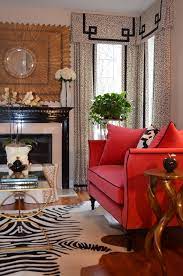 It can create a stunning and sophisticated look that will leave a strong impression in the mind of everyone who sees it. Raspberry Black Rugs In Living Room Living Room Red Interior Design