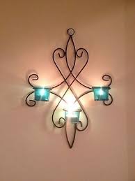 Buy top selling products like danya b™ contemporary wall sconce with medallions (set of 2) and danya b.™ vintage black metal wall sconce candle holders (set of 2). 4 Piece Metal Wall Art Sconce Set 3 Blue Teal Tea Light Glass Candle Holders Metal Wall Art Wall Glass Candle Holders