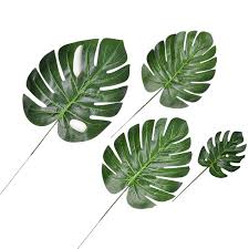 The monstera, the trendy plant of the moment. Buy Online 10pcs Fake Faux Artificial Tropical Palm Leaves Green Monstera Leaves For Home Kitchen Party Decorations Handcrafts Wedding Diy Alitools