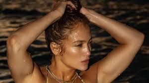 She is known to be an american by nationality and follows the christianity religion. Jennifer Lopez Stuns In Tiny Bikini At Age 51