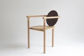 A Three Legged Wooden Chair By Milk Design Scandinavian Chairs Chair Design Wooden Chair