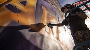 The kobe bryant action figure sports helicopter blades coming out of the top of his head. C8fxicpdkm87fm