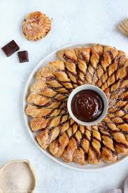 Churro Cinnamon Tarte Soleil With Chocolate Sauce Del S Cooking Twist Recipe In 2020 Hot Chocolate Sauce Finger Food Desserts Kid Friendly Recipes Dessert