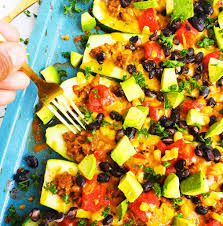 Top each with 1 tablespoon of shredded cheese. Easy Cheesy Taco Stuffed Zucchini Boats Beautiful Eats Things