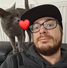 When I played as a kid I used to build custom designs by building them,  saving the design, then reloading a save and putting the saved design into  my park. This only