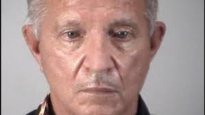 Florida city manager charged with poking council member during fight