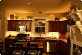 Rope Lights In Kitchen Wainscoting As A Backsplash And Up To The Top Of The C Above Kitchen Cabinets Decorating Above Kitchen Cabinets Kitchen Cabinets Decor