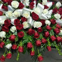 BED OF ROSES CASKET SPRAY in Mesquite, TX | Stacie's Lazy Daisy