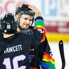 Ice hockey is a contact team sport played on ice, usually in an indoor or outdoor rink, in which two teams of skaters use their sticks to shoot a vulcanized rubber puck into their opponent's net to score. Hockey Player Zach Sullivan Comes Out As Bisexual Outsports